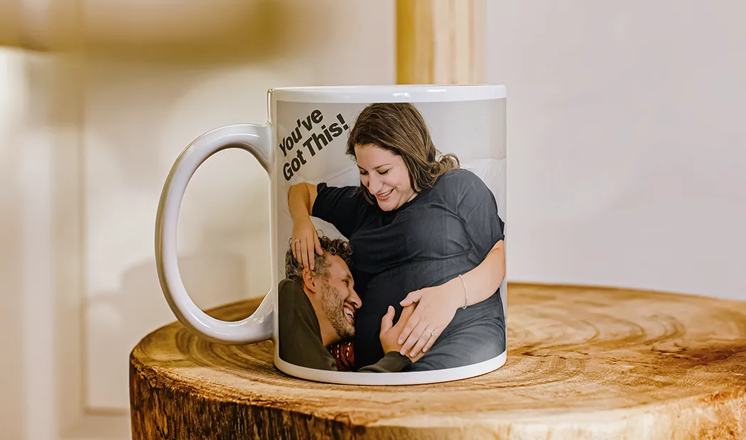 Personalised Photo Mug|Mum and baby holding Printerpix cartoon design custom mug with dad text|Personalised photo mug with picture of baby crawling wearing animal overall|Mom and daughter holding custom designed photo mugs with family photos|Kissing couple with personalized mugs with text on|Personalised photo mug with your own photo of a dog on|||||