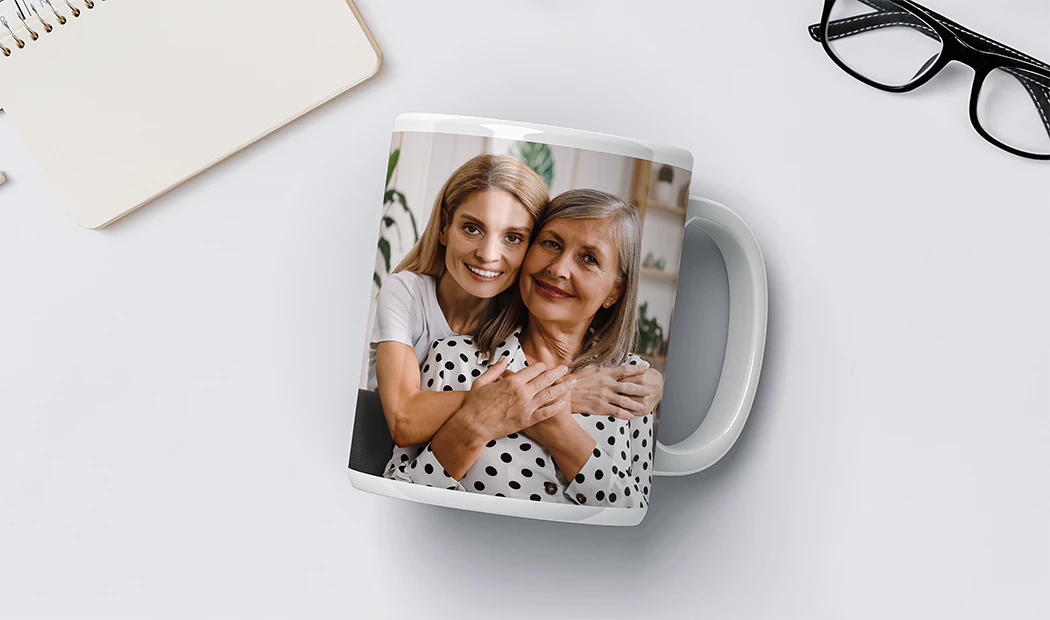 Personalised Photo Mug|Mum and baby holding Printerpix cartoon design custom mug with dad text|Personalised photo mug with picture of baby crawling wearing animal overall|Mom and daughter holding custom designed photo mugs with family photos|Kissing couple with personalized mugs with text on|Personalised photo mug with your own photo of a dog on|||||