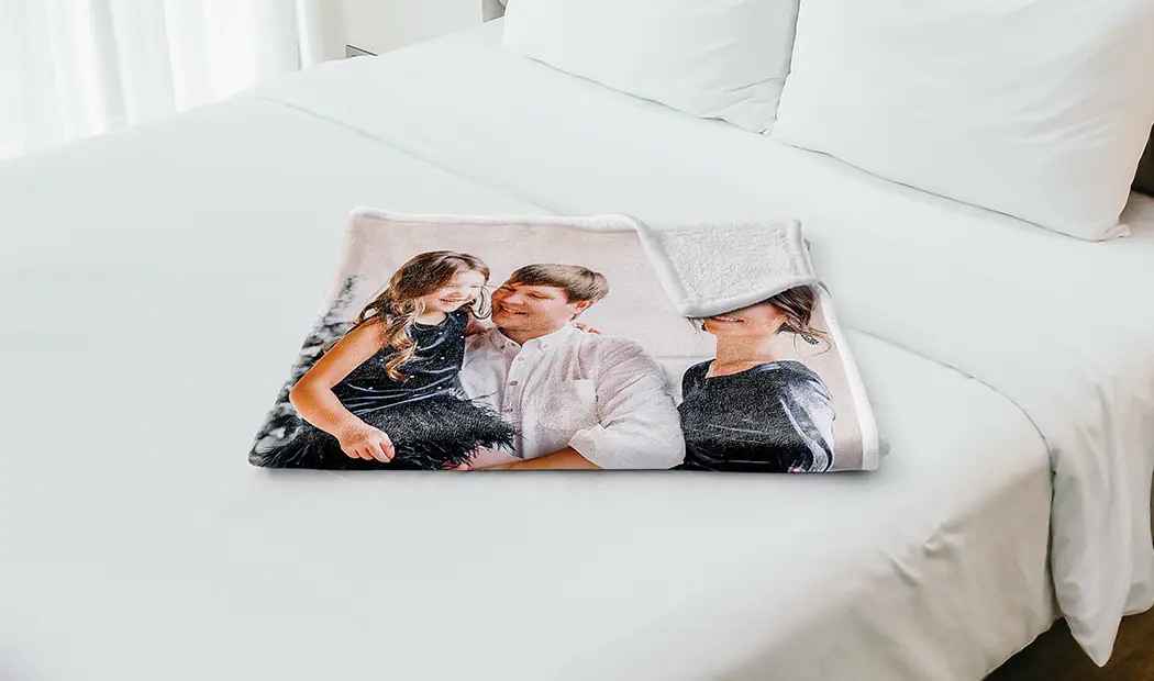 Custom Fleece Blanket by Printerpix|Custom Fleece Blanket|Child holding custom fleece blanket with pets|Custom fleece blanket on a bed with family photo|Couple wrapped in custom fleece blanket|Custom fleece blanket on bed|||||