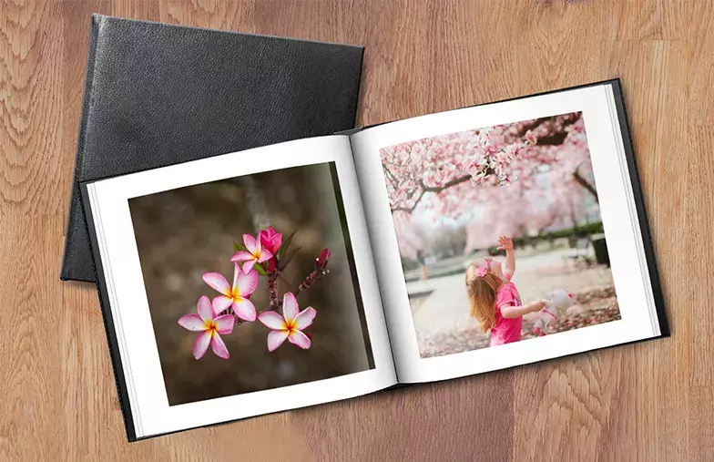 Printed personalized photo book with pictures of mother and son and photo cover